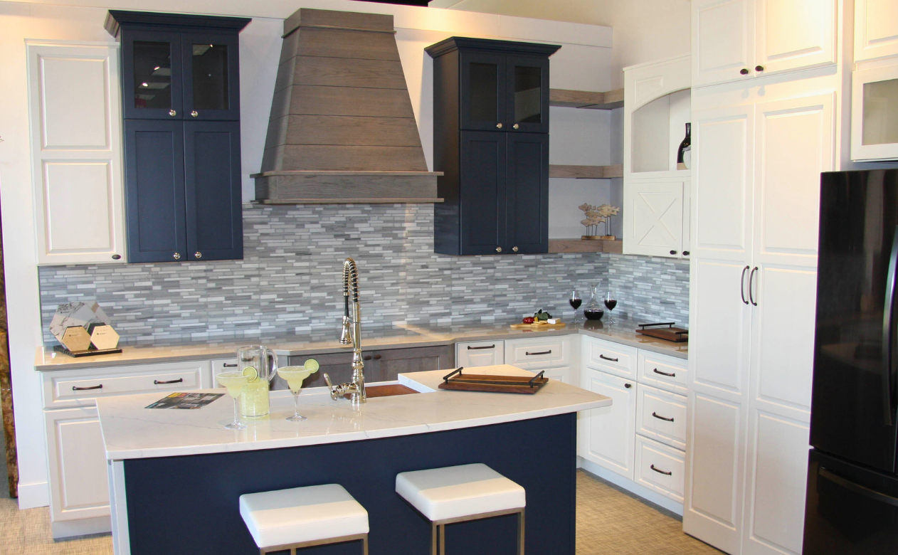 White and navy blue cabinets in a Kiba Studios kitchen display