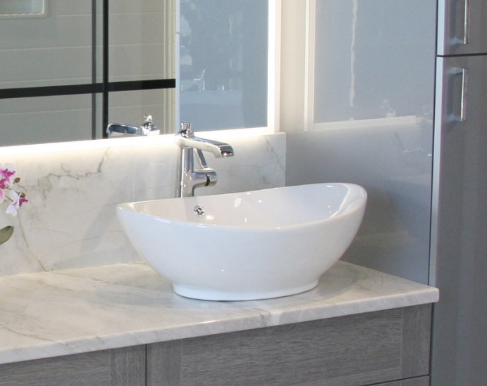 Sinks in a designer bathroom at Kiba Studios in Spirit Lake, IA