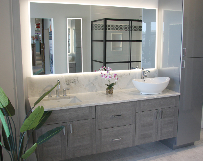 Gray bathroom cabinets and vanity at Kiba Studios in Spirit Lake