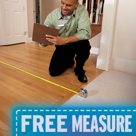flooring salesperson measuring floor